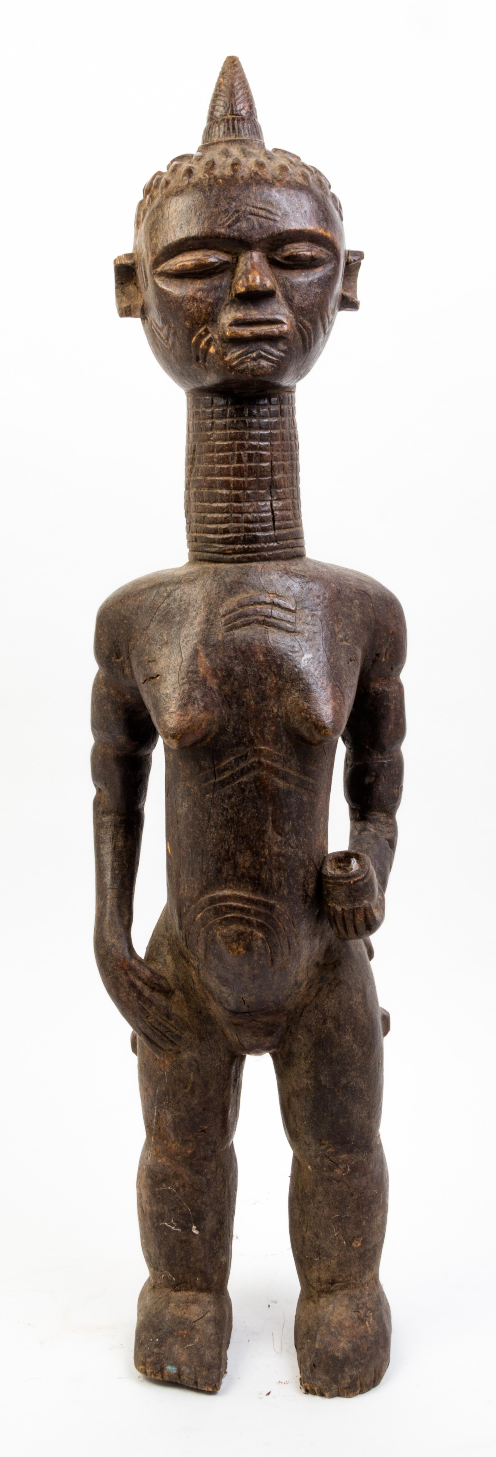 A Baule Wood Figure of a Woman Height 33 1/2 inches.
