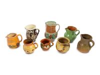 Eight European Pottery Pitchers