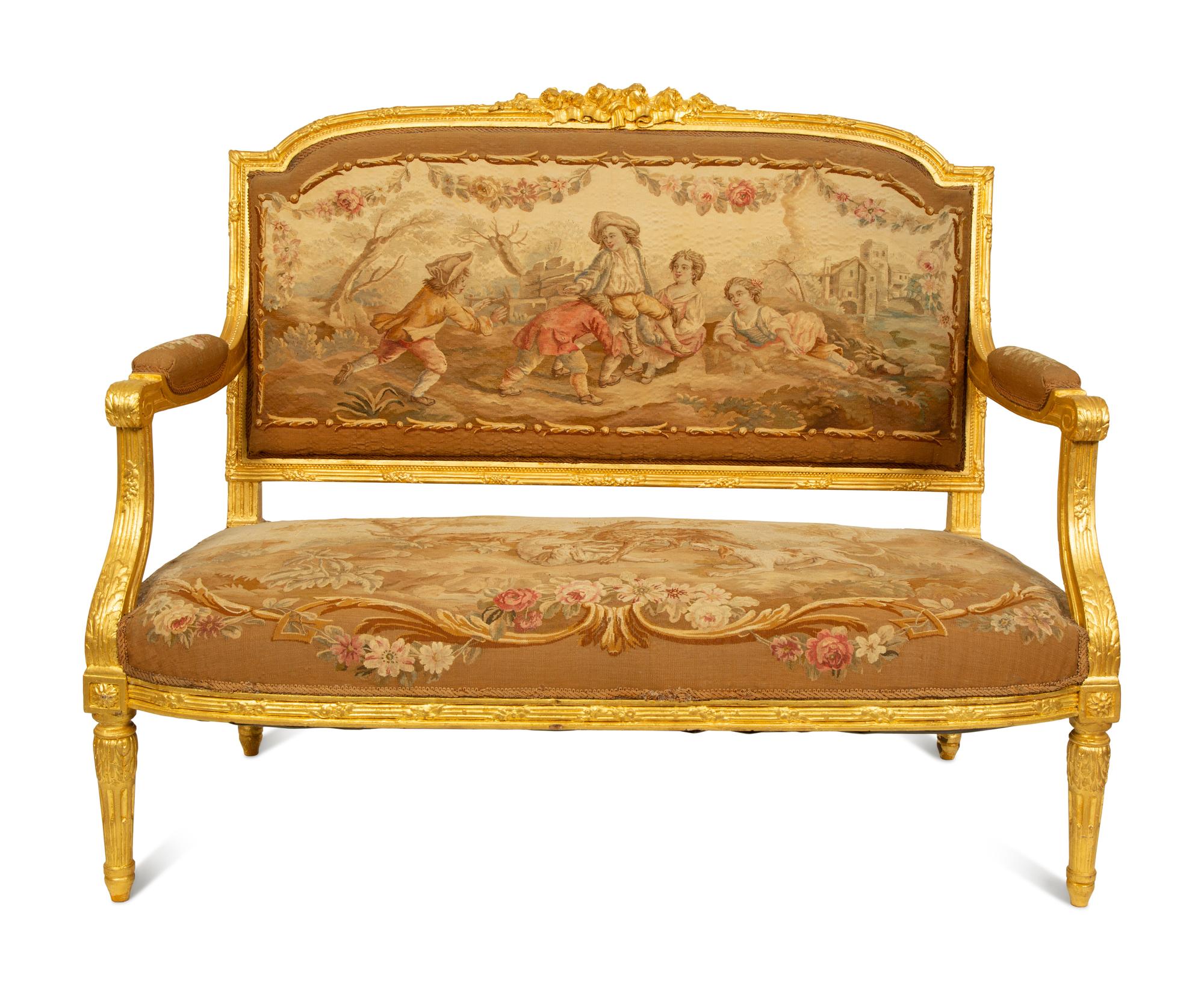 A Louis XVI Style Giltwood Settee with Tapestry Upholstery — LATE 19TH CENTURY