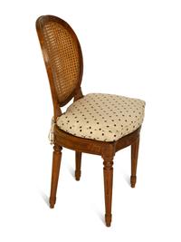 A Set of Four Louis XVI Style Side Chairs