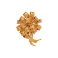 TIFFANY & CO., RUBY AND YELLOW GOLD RIBBON BROOCH