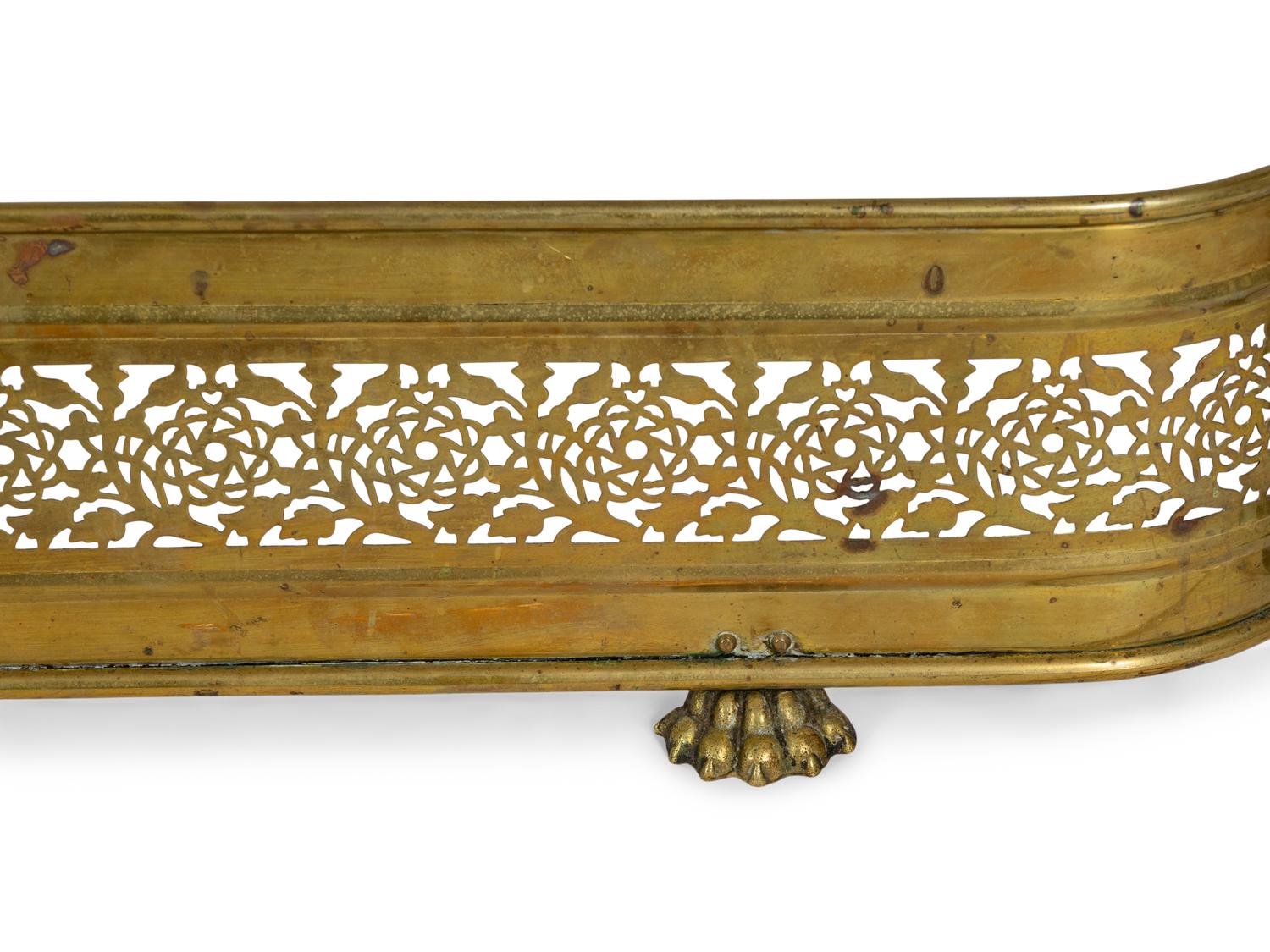 A Group of Federal and Classical Style Brass and Iron Fireplace Accessories