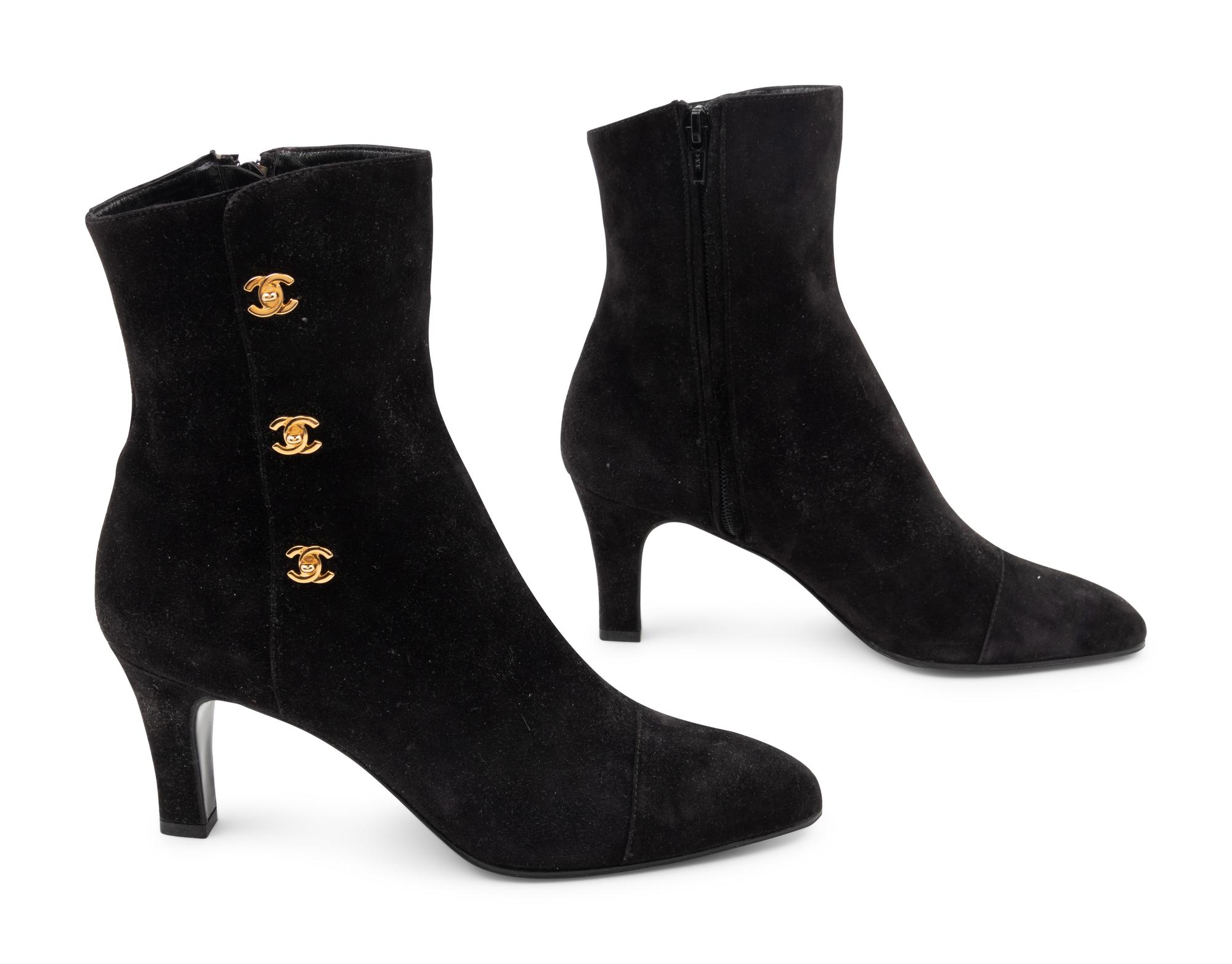 Three Pairs of Designer Boots: One Chanel, One Prada, One Celine