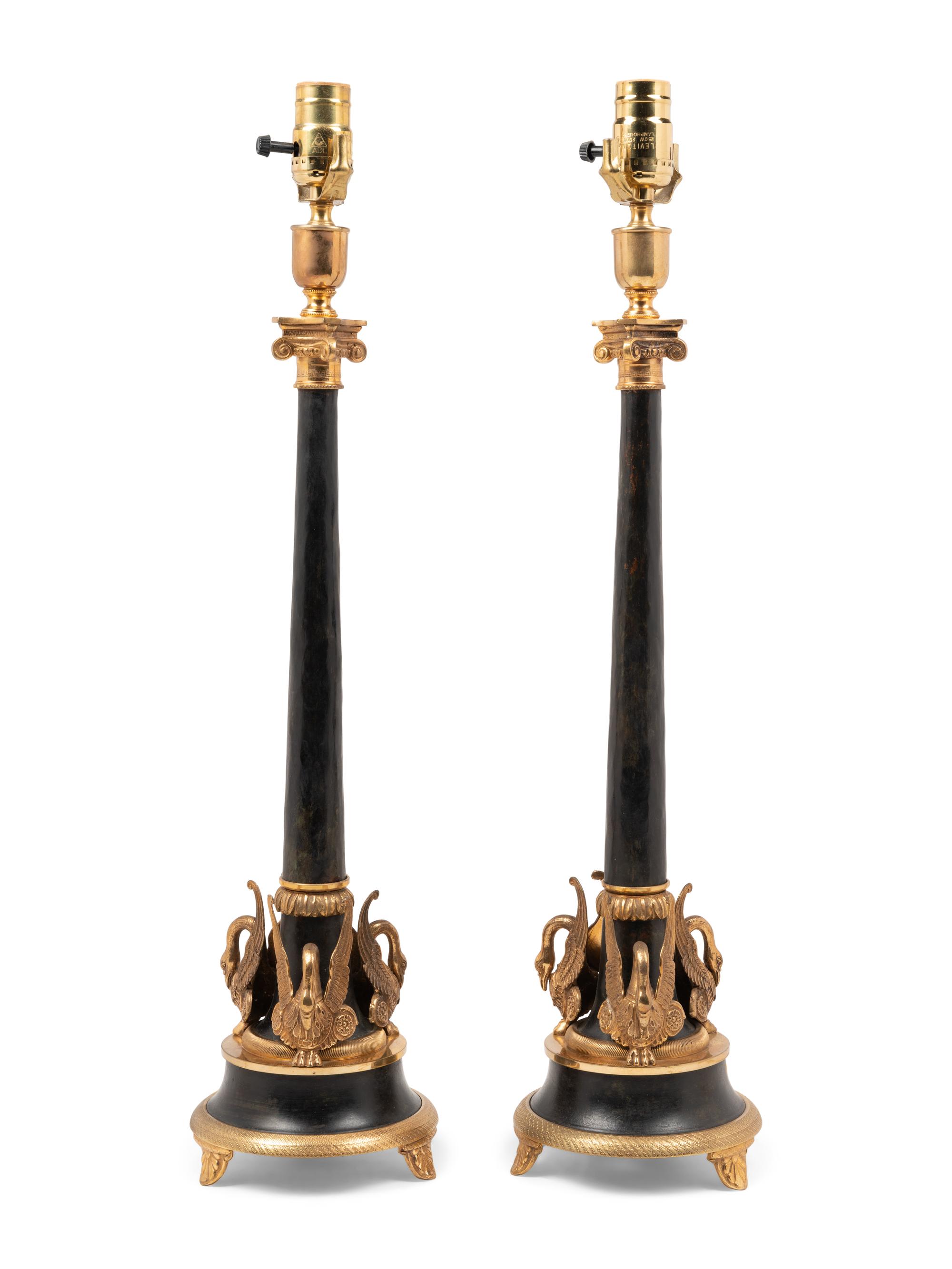 A Pair of Empire Style Gilt Metal Mounted Lamps