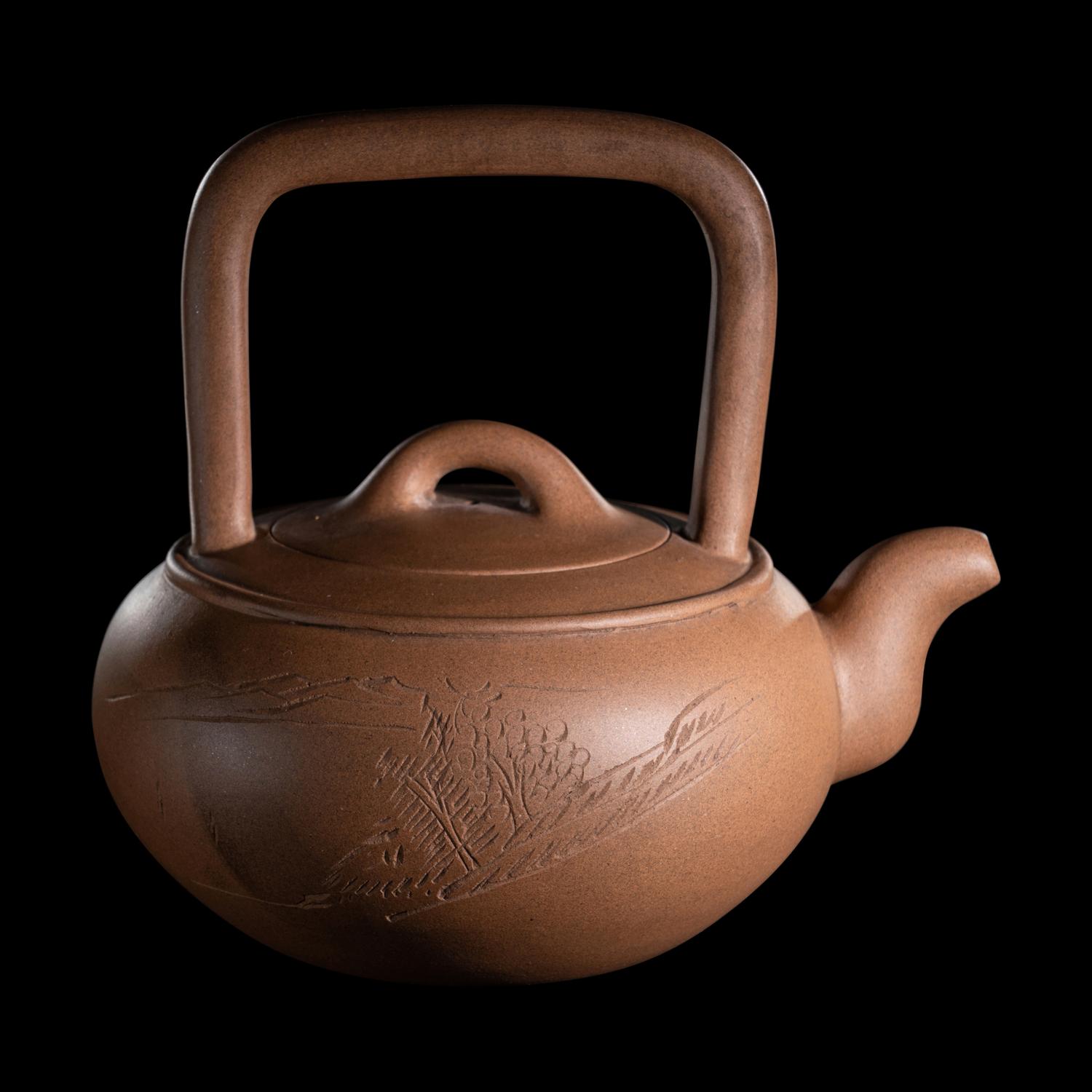 A Chinese Yixing Zisha Pottery Teapot