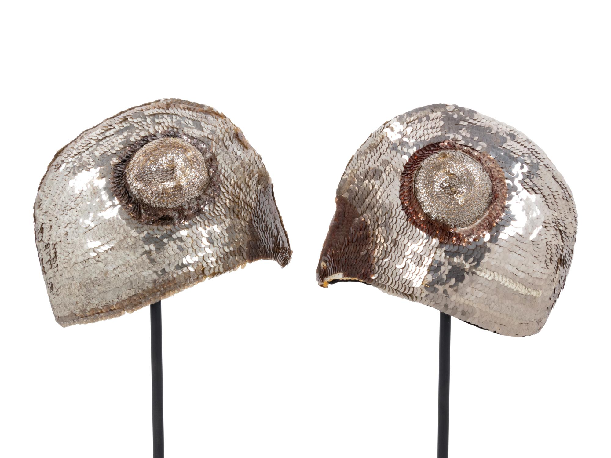 A Pair of Southeast Asian Headdresses on Stands