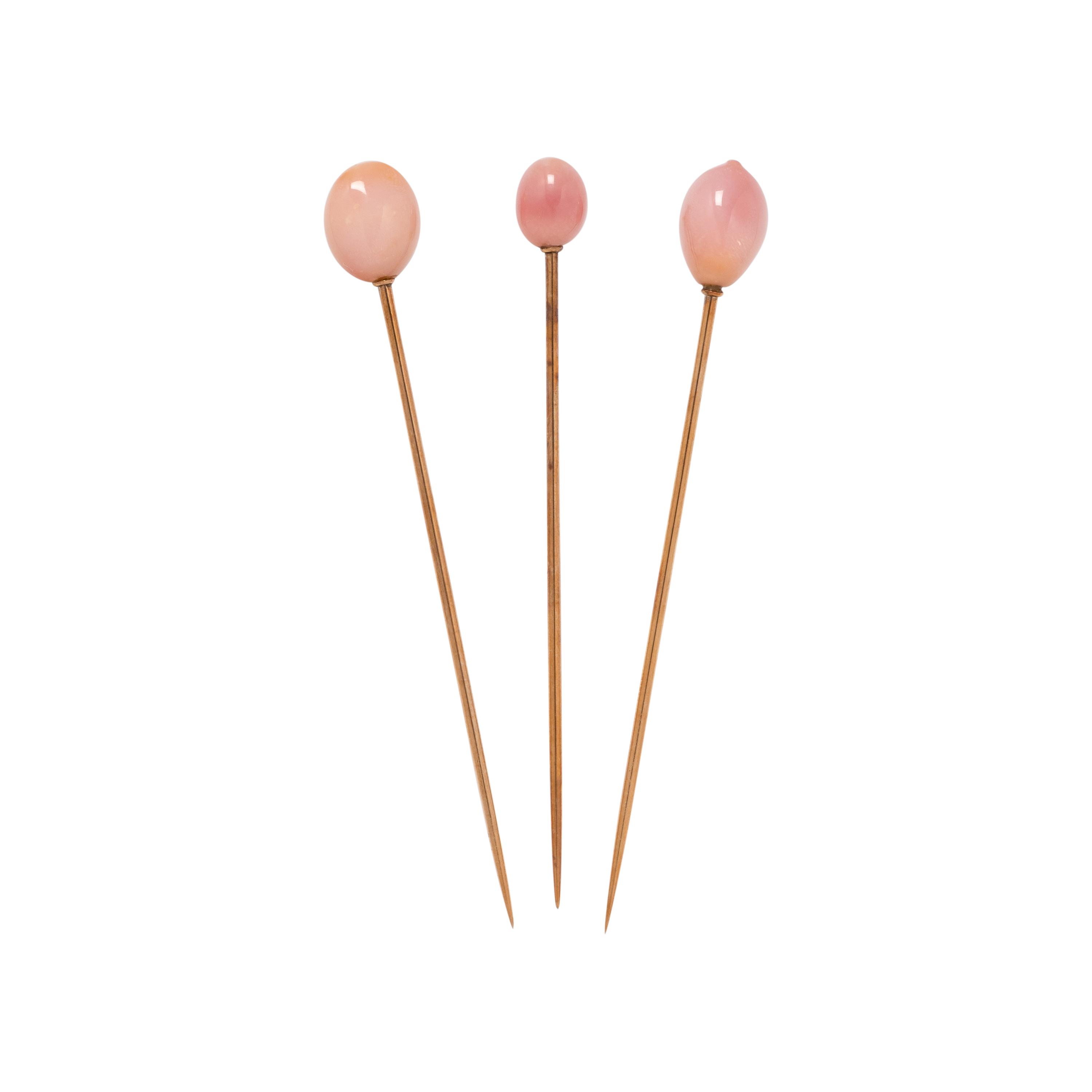 COLLECTION OF CONCH PEARL STICK PINS