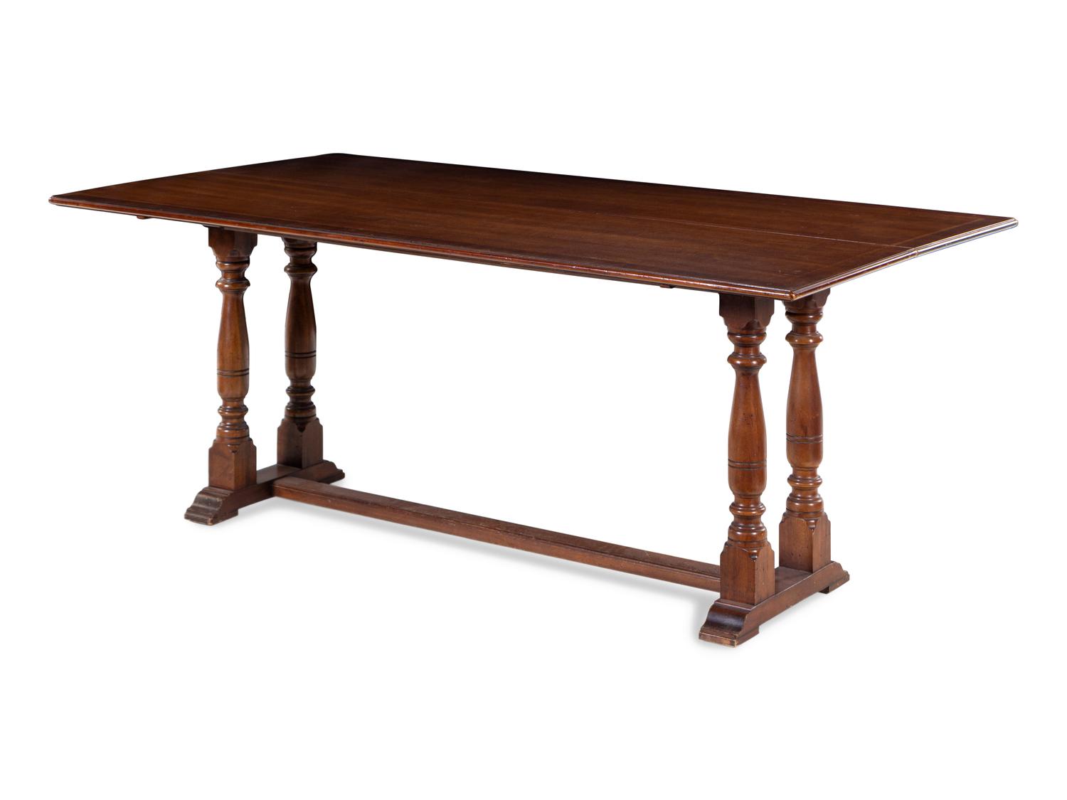 A Baroque Style Mahogany Extension Library Table