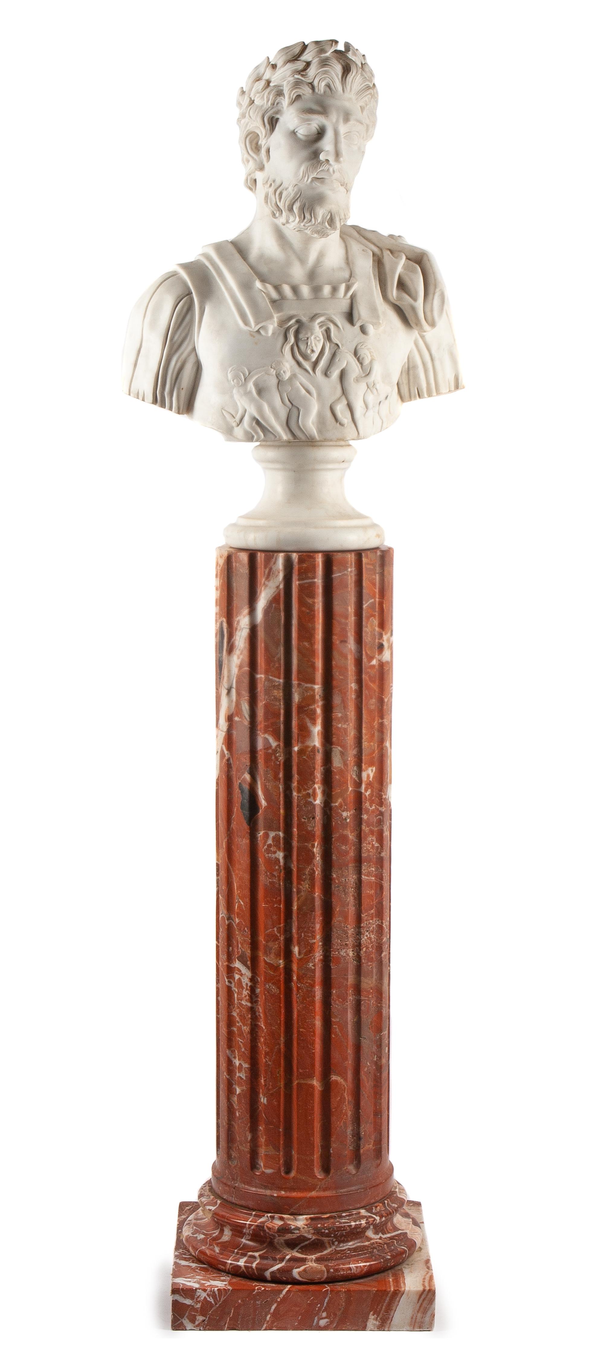An Italian Carved Marble Bust and Pedestal Height of bust 30 inches; height of pedestal 47 inches.