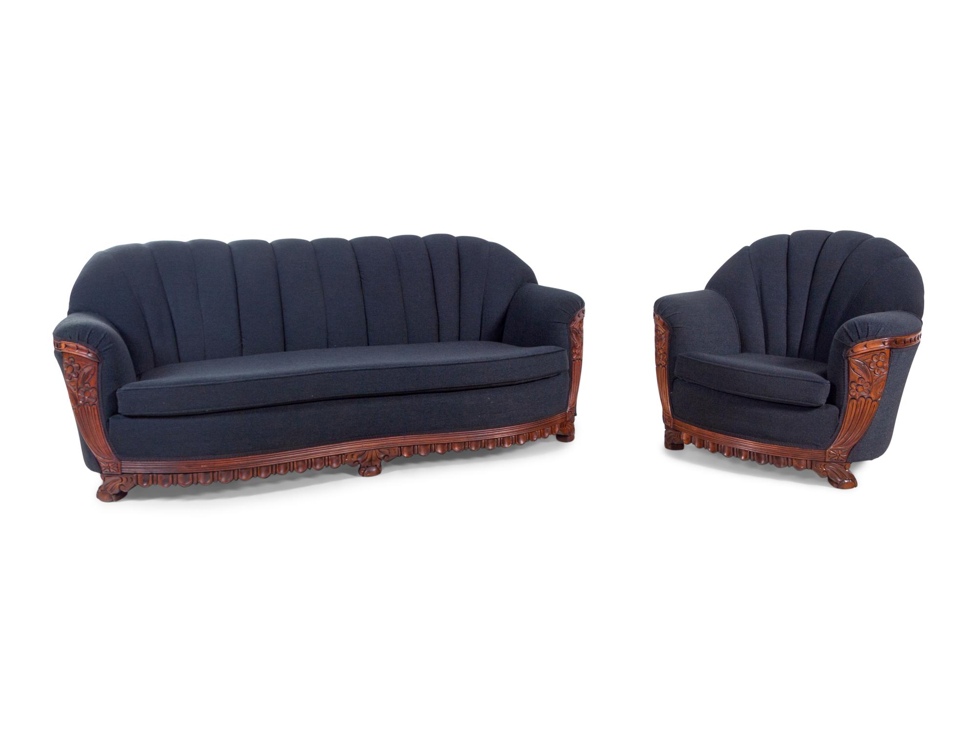 An Art Deco Style Carved Walnut Sofa and Armchair