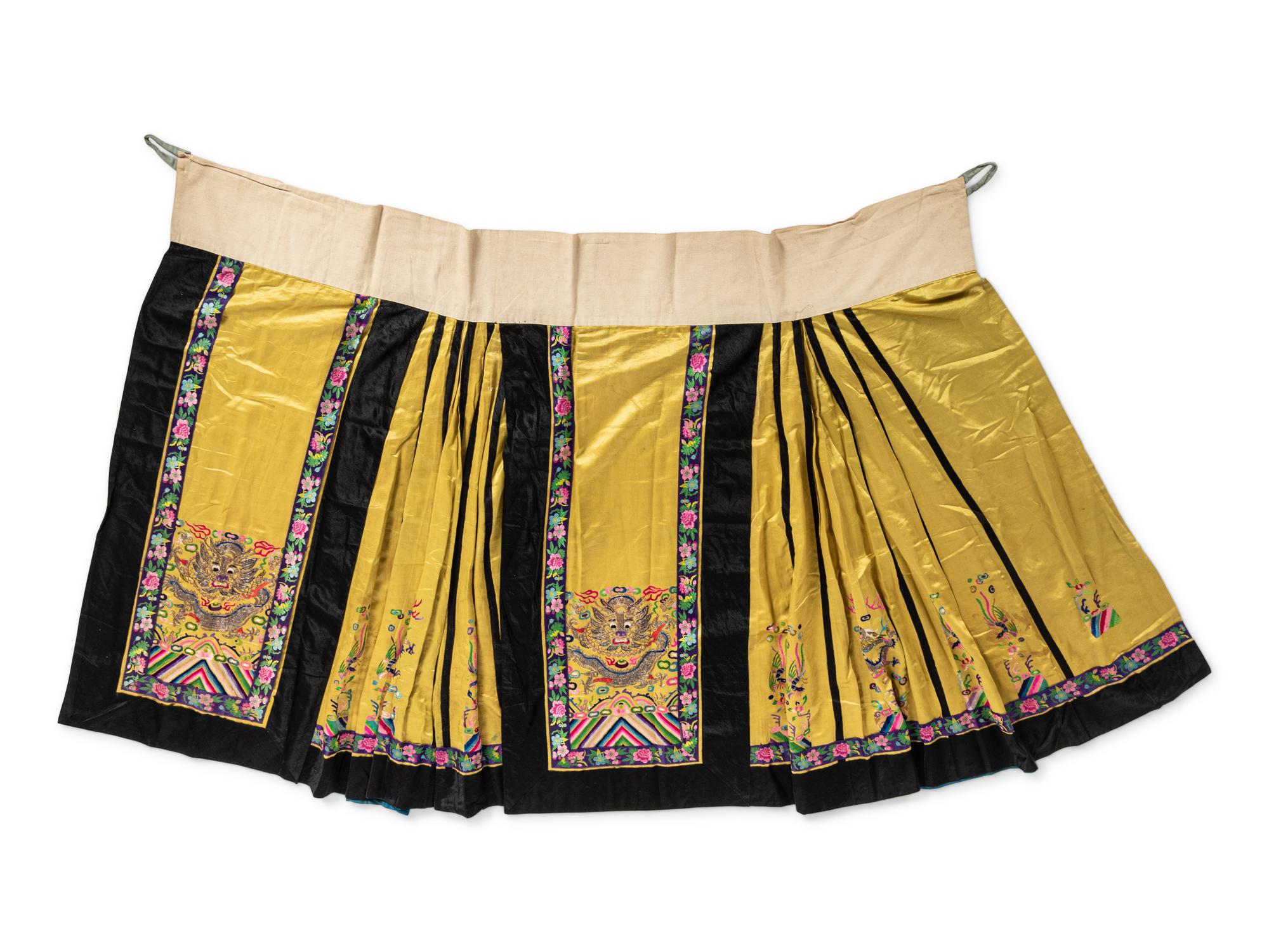 A Chinese Lady's Embroidered Silk Jacket and A Yellow Ground Silk Apron Skirt