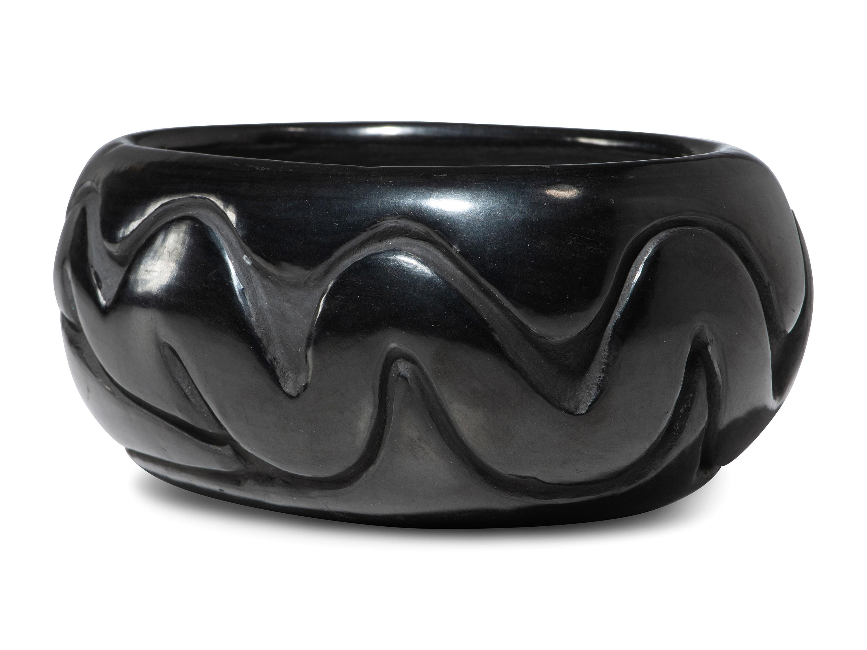 Carved Blackware Pottery Jar, with Avanyu