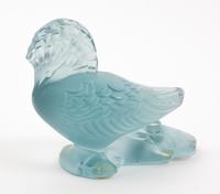 A Lalique Molded and Frosted Glass Figure Height 3 1/4 inches.
