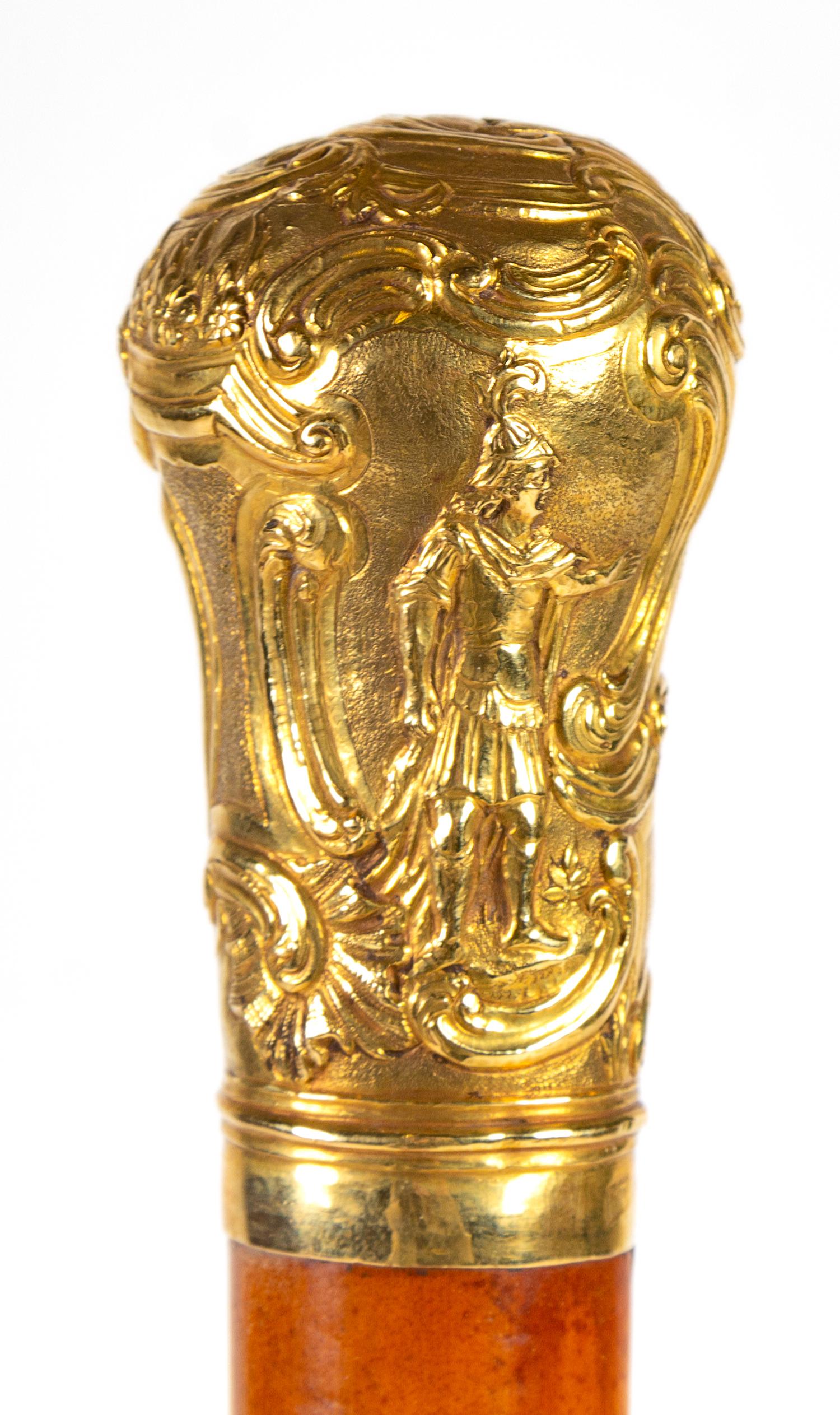 A Continental 22-Karat Gold Mounted Walking Stick Length 35 1/2 inches. — 19TH CENTURY