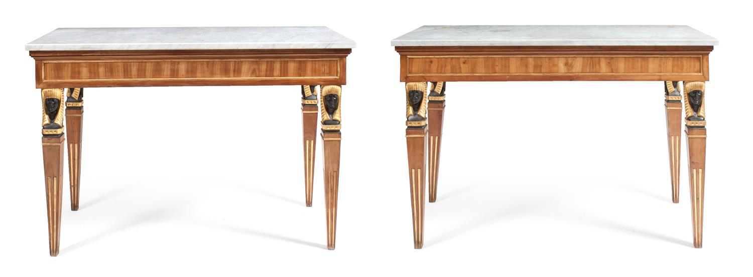 A Pair of Italian Empire Style Black Painted and Parcel Gilt Fruitwood Console Tables Height 38 3/4 x width 55 1/4 x depth 27 1/2 inche — 19TH CENTURY