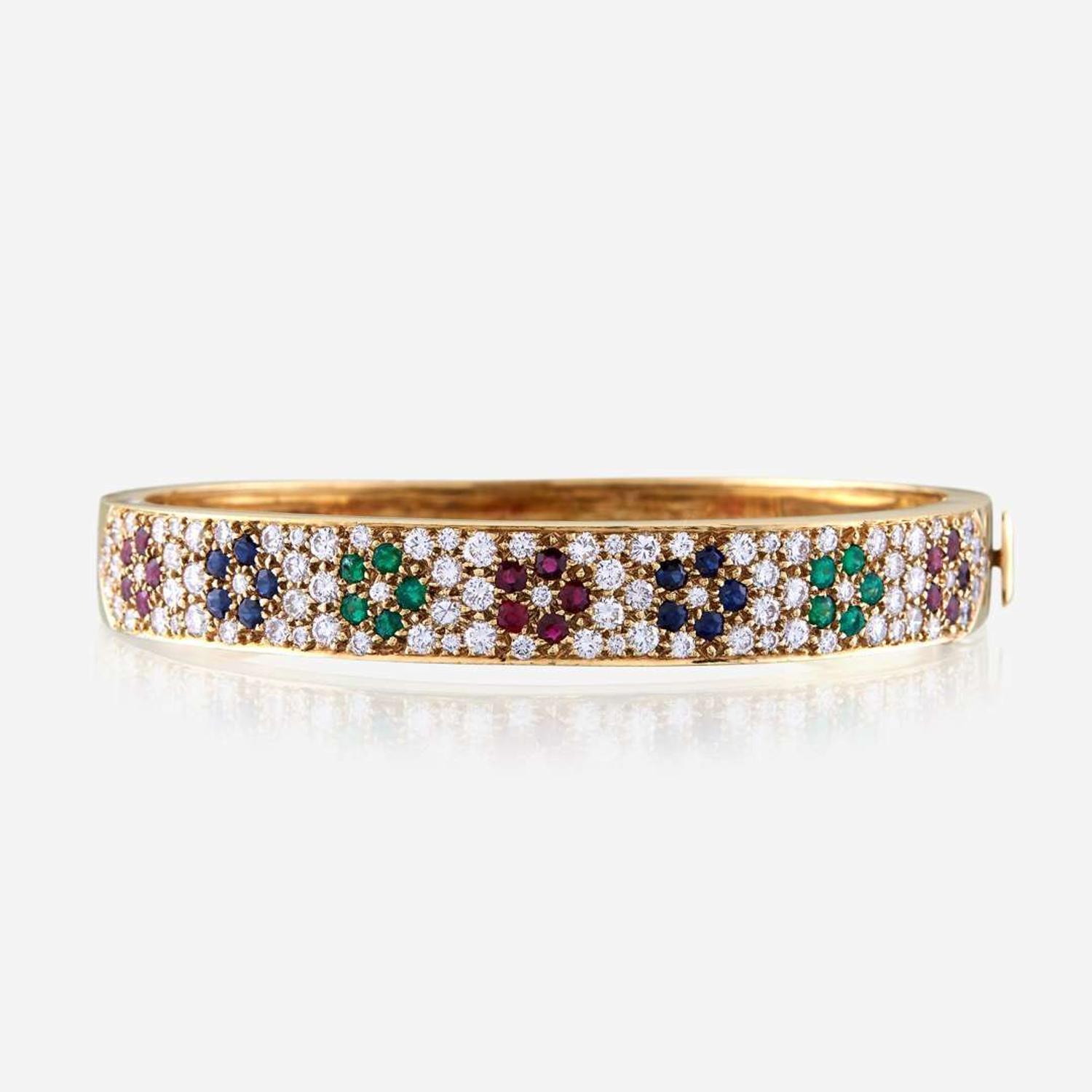 An eighteen karat gold and gem-set bangle, Van Cleef & Arpels