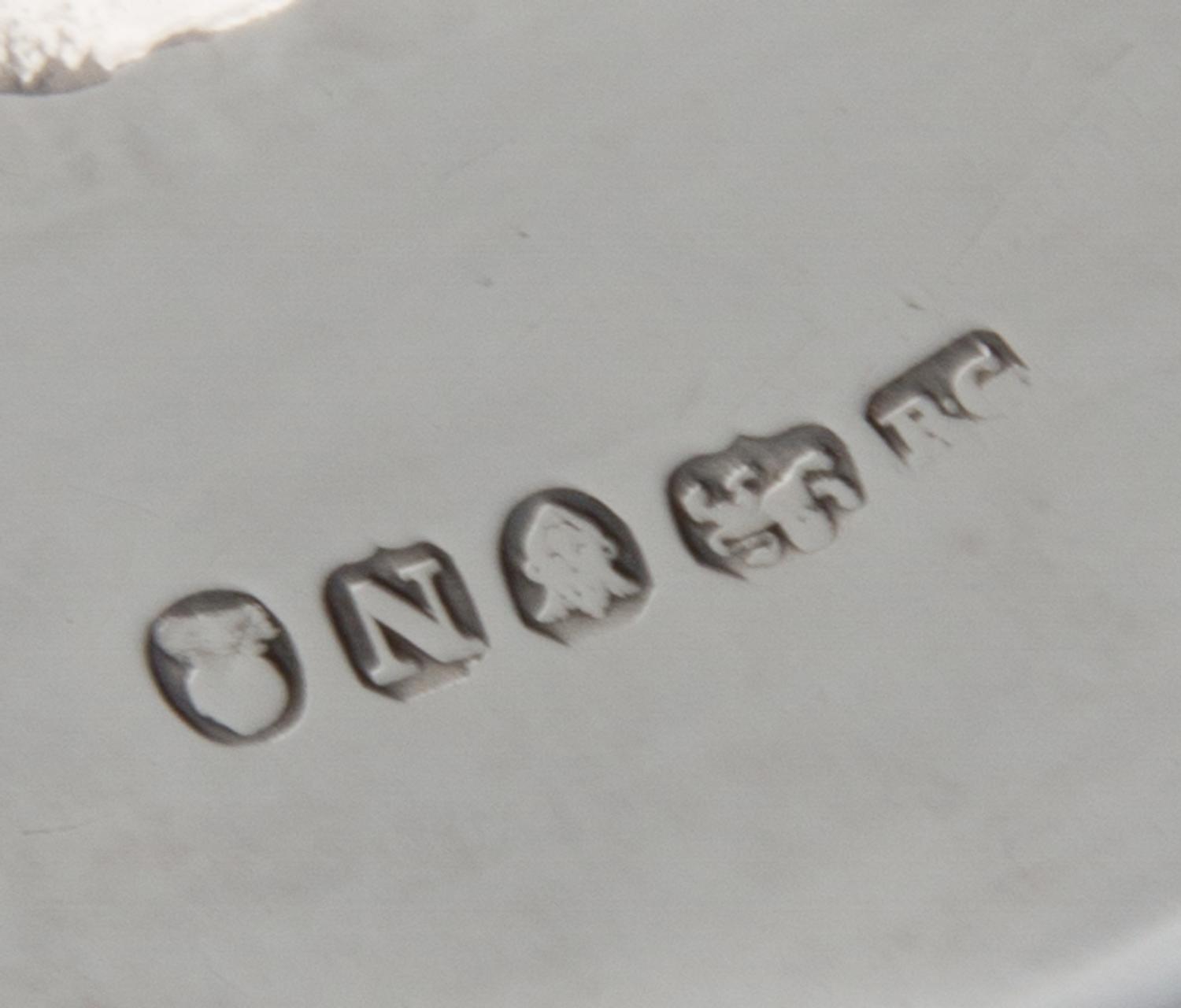 A George III Silver Chamberstick, Robert Gerrard I, London, 1808, of typical form with a gadrooned rim, raised on S-scroll feet.