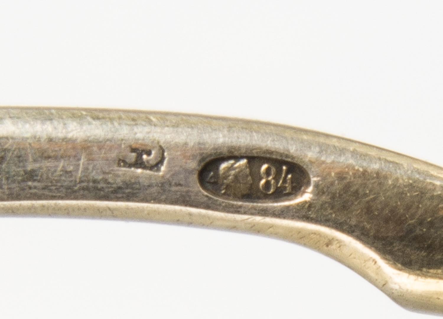 A Russian Silver-Gilt and Enamel Spoon, Maker's mark obscured, Moscow, late 19th/early 20th century, having a twist handle and polychro