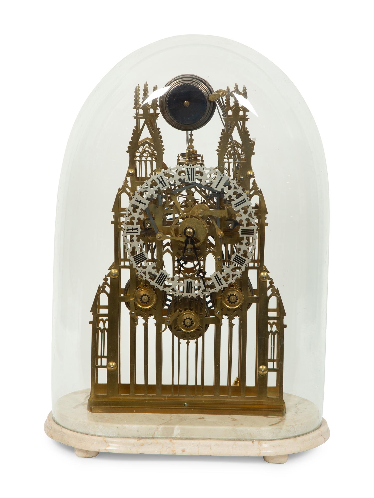An English Gothic Revival Brass Musical Skeleton Clock