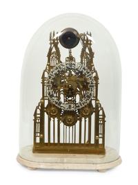 An English Gothic Revival Brass Musical Skeleton Clock