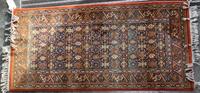 A Northwest Persian Wool Rug 62 3/4 x 30 1/2 inches.