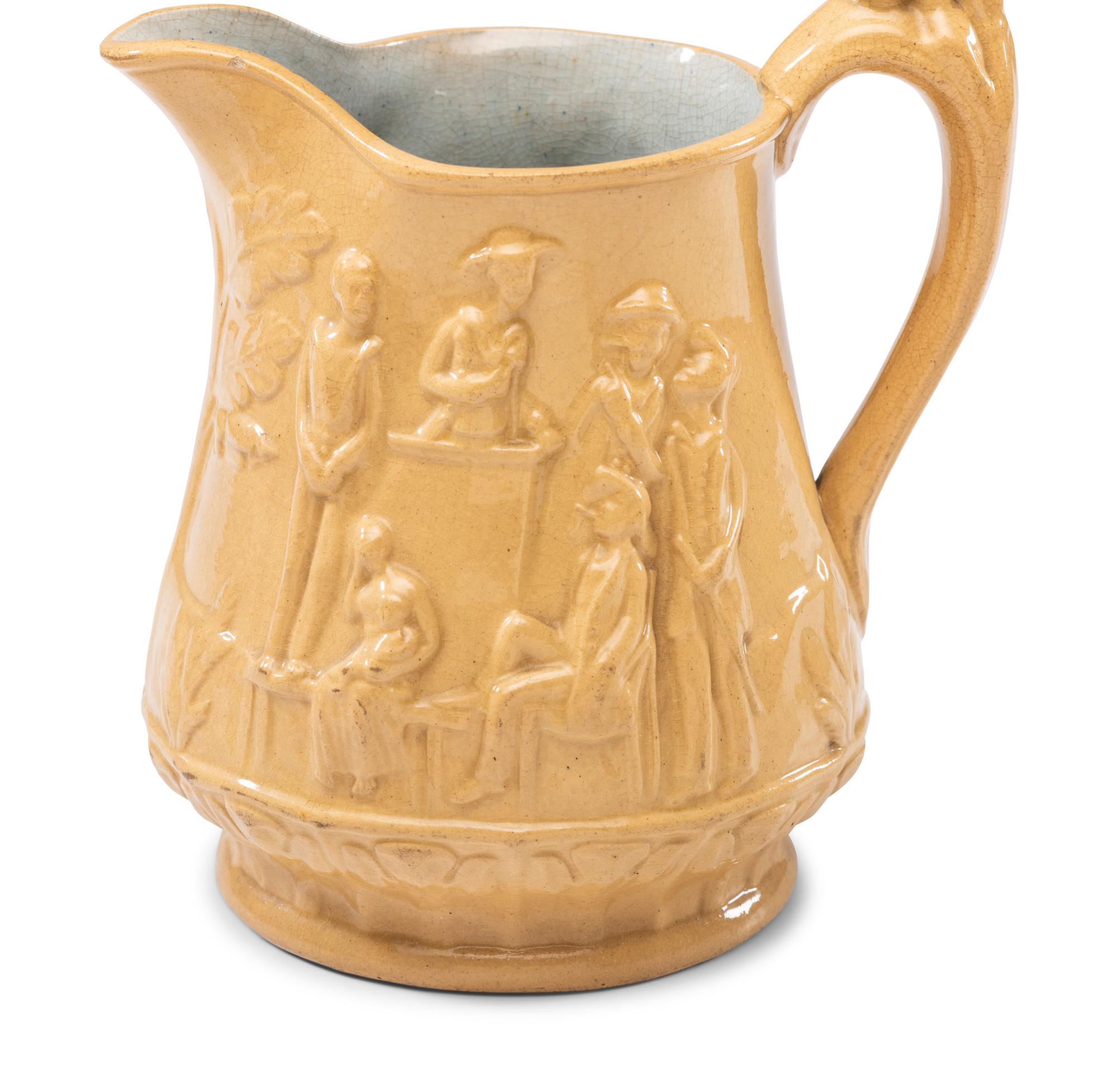 Five Graduated Abolitionist Yellowware Pitchers with Molded Scenes from Uncle Tom's Cabin
