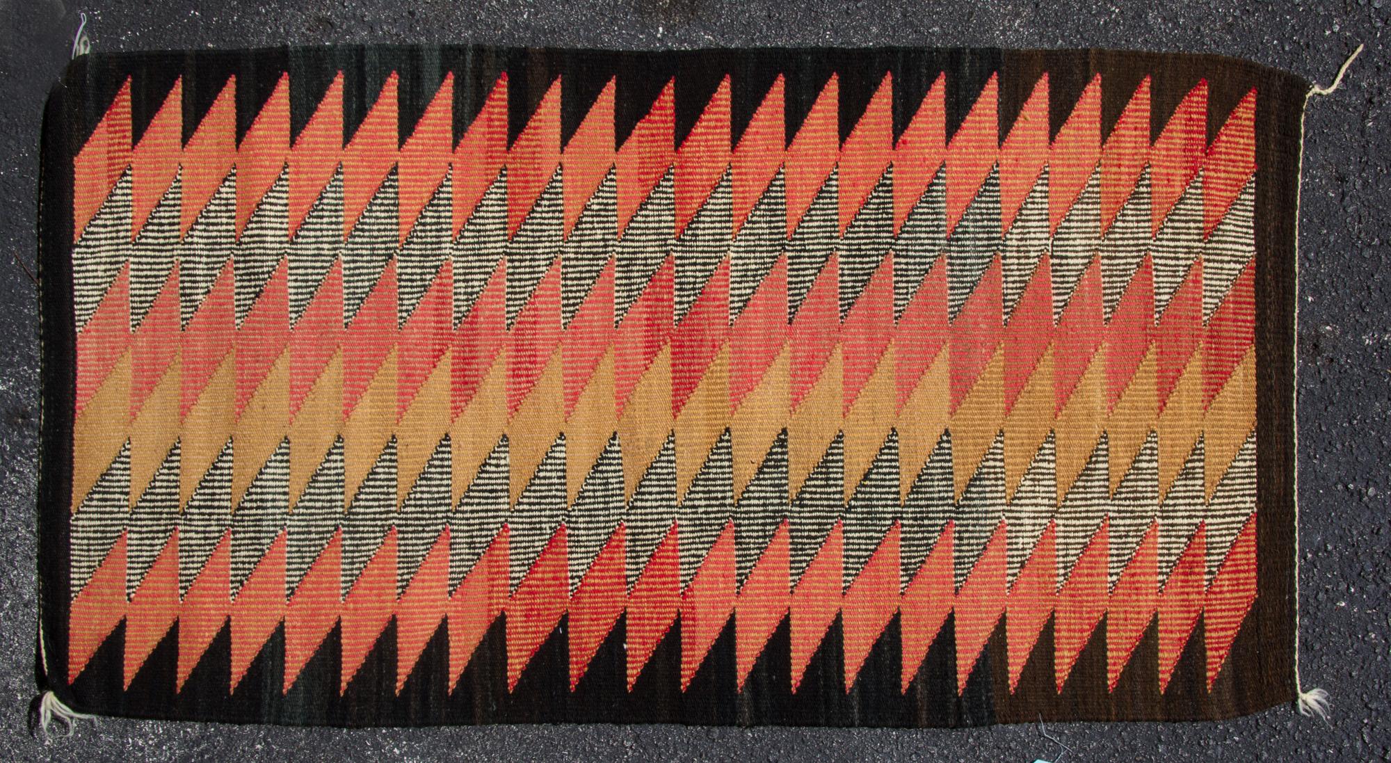 Two Indian Flat Woven Wool Rugs Dimensions of larger 4 feet 11 inches x 2 feet 8 1/2 inches. — 20TH CENTURY