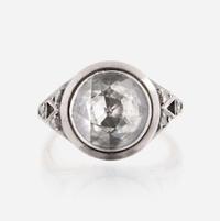 A diamond, sterling silver, and gold ring