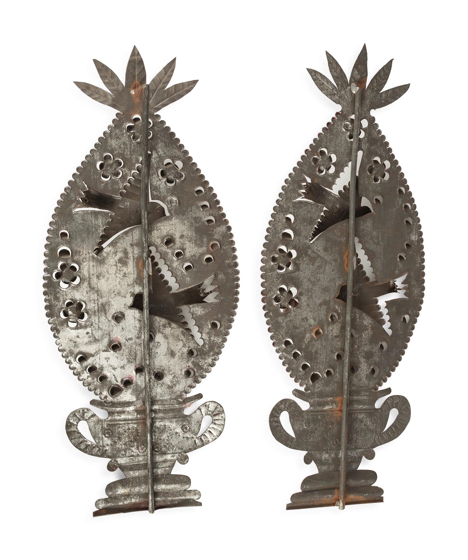 A Pair of Punched and Painted Tin Outdoor Decorations