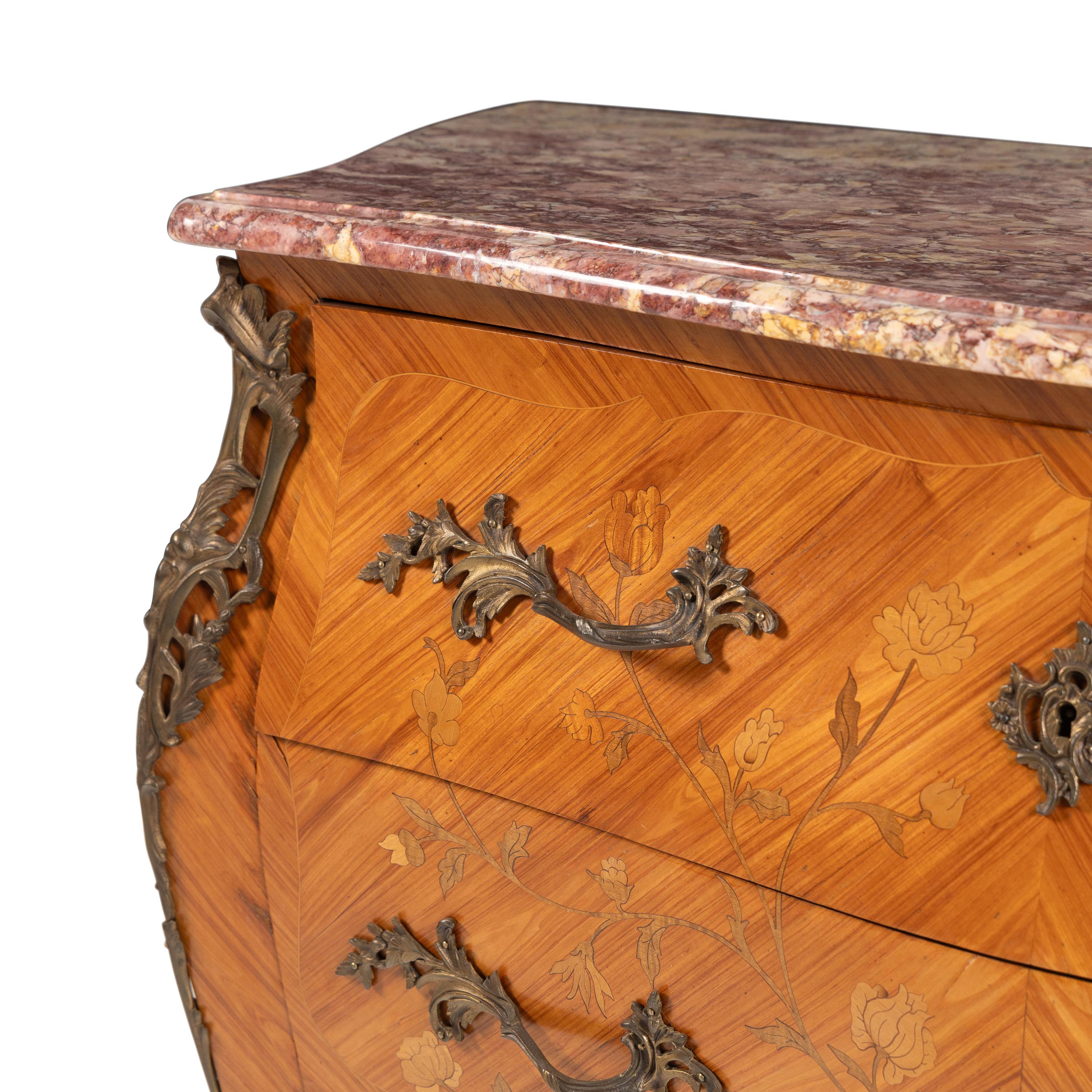 A Louis XV Style Gilt Bronze Mounted Tulipwood, Marquetry, and Spanish Brocatelle Marble-Top Commode