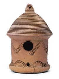 An Incised Sewer Tile Birdhouse