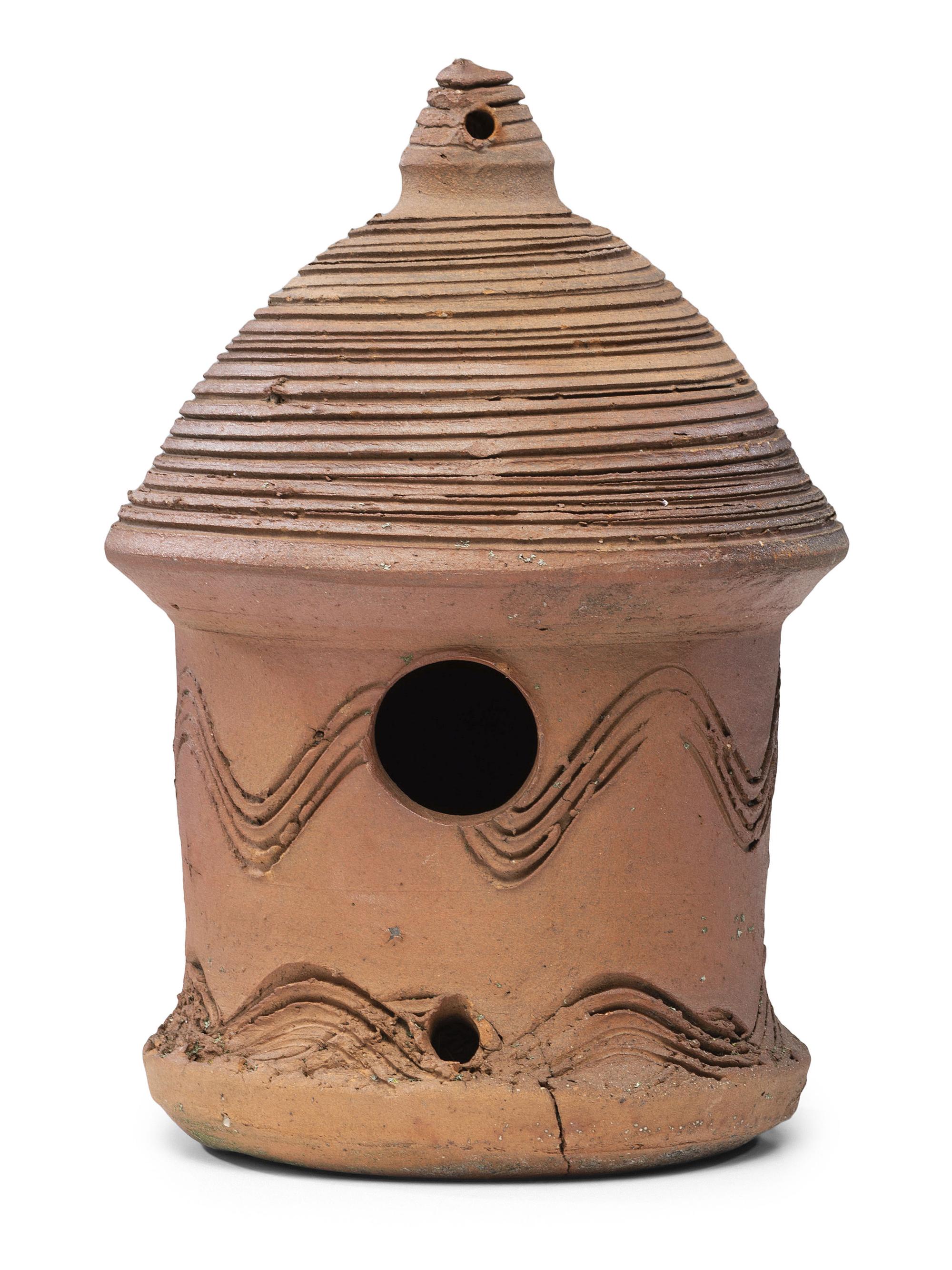 An Incised Sewer Tile Birdhouse
