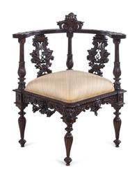 A Renaissance Revival Carved Walnut Corner Chair
