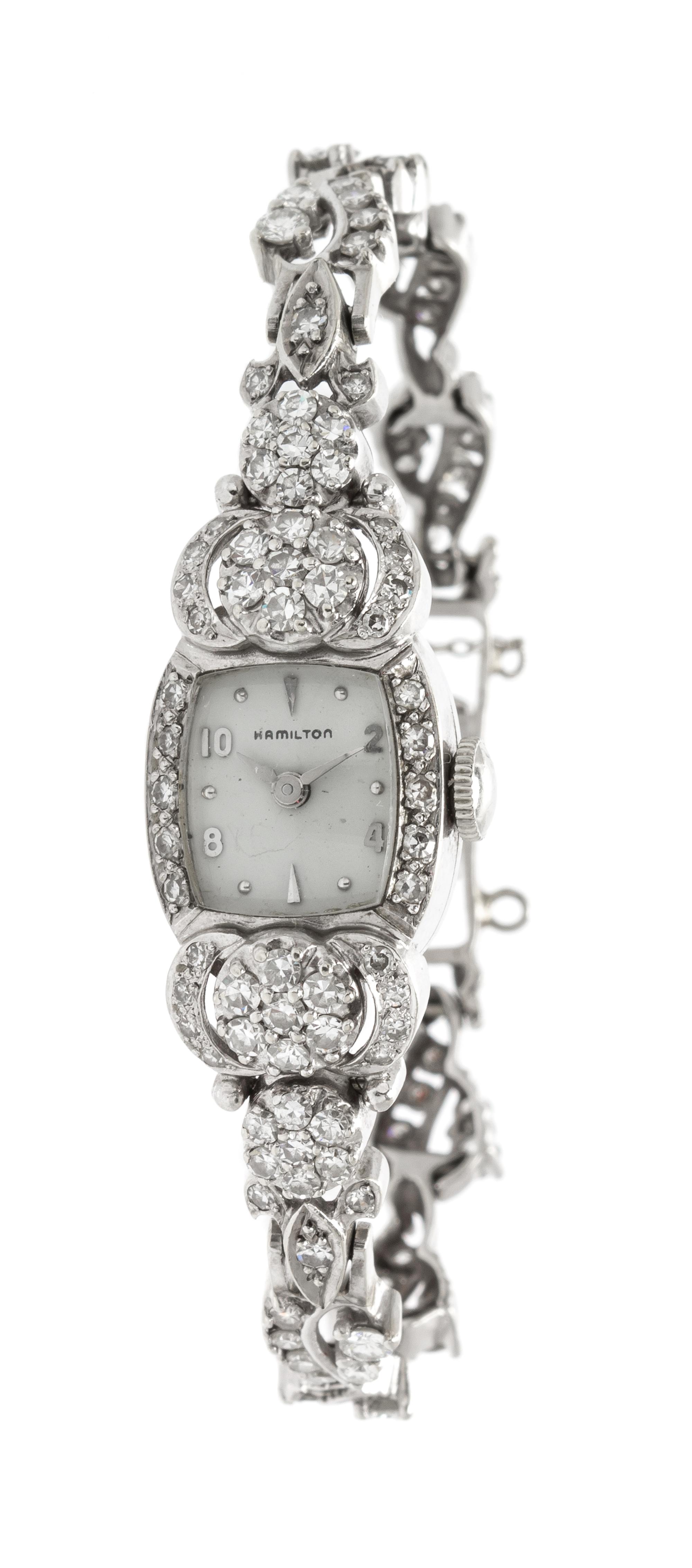 A 14 Karat White Gold and Diamond Wristwatch, Hamilton, 12.60 dwts.