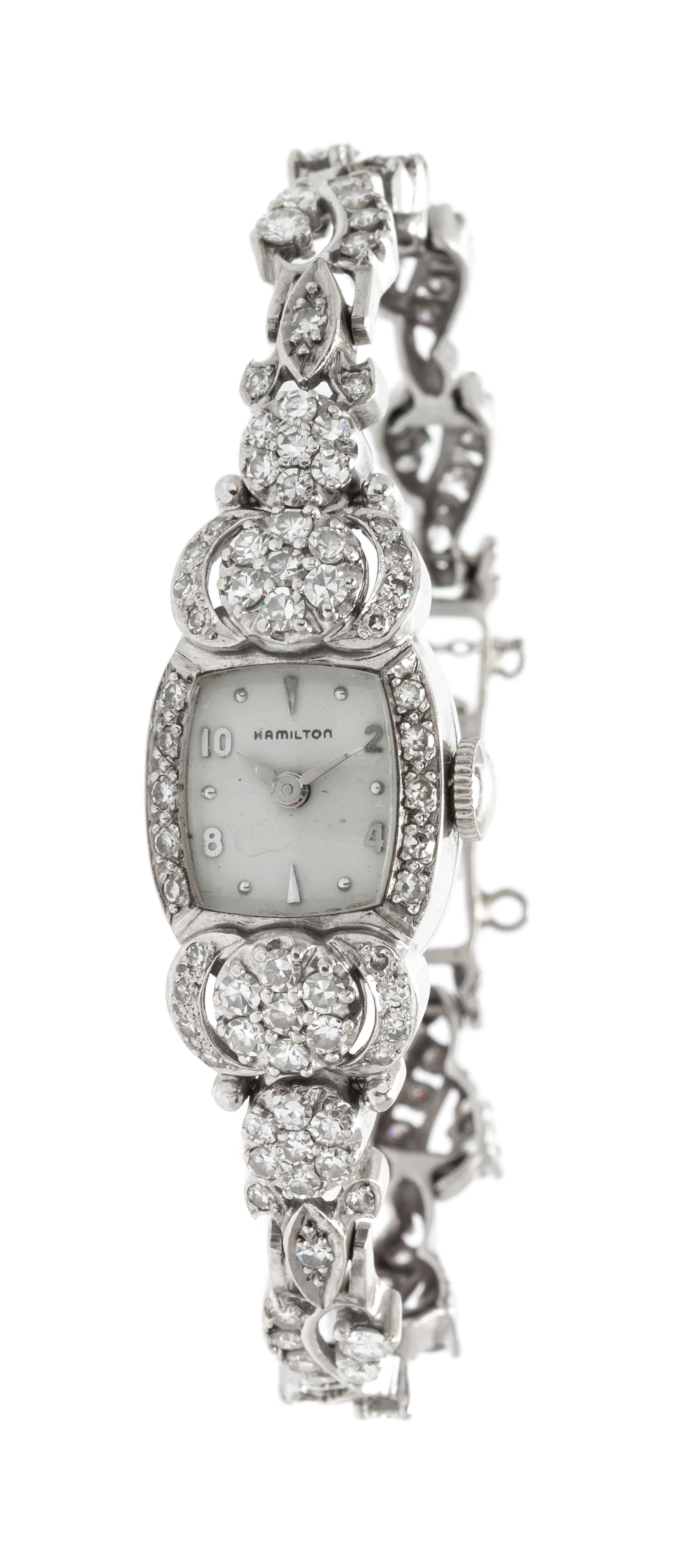 A 14 Karat White Gold and Diamond Wristwatch, Hamilton, 12.60 dwts.