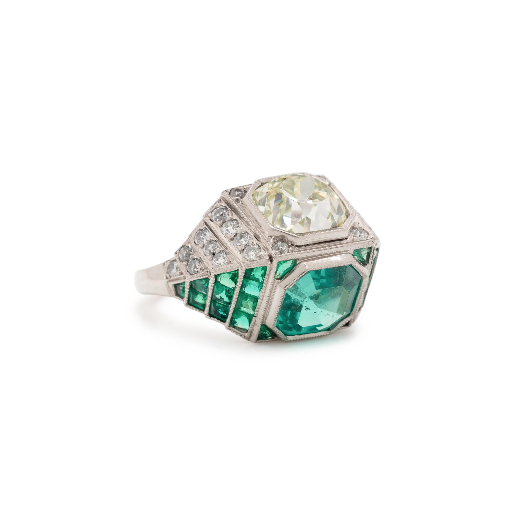 ART DECO, EMERALD AND DIAMOND SCULPTURAL 'TOI ET MOI' RING