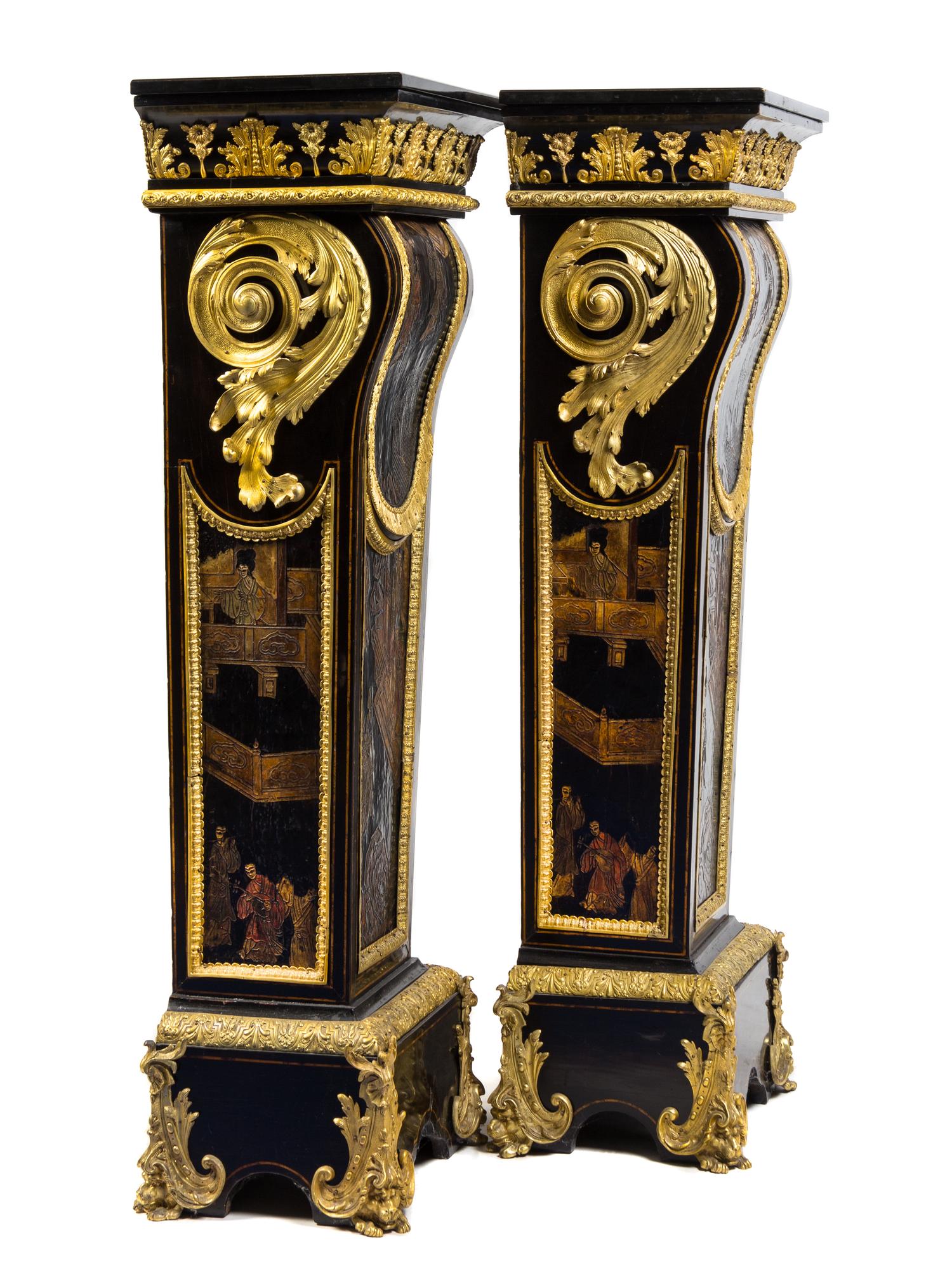 A Pair of Napoleon III Gilt Bronze Mounted and Coromandel Lacquer Inset Ebony Pedestals Height 55 1/2 x width 20 3/4 x depth 13 7/8 inc — 19TH CENTURY