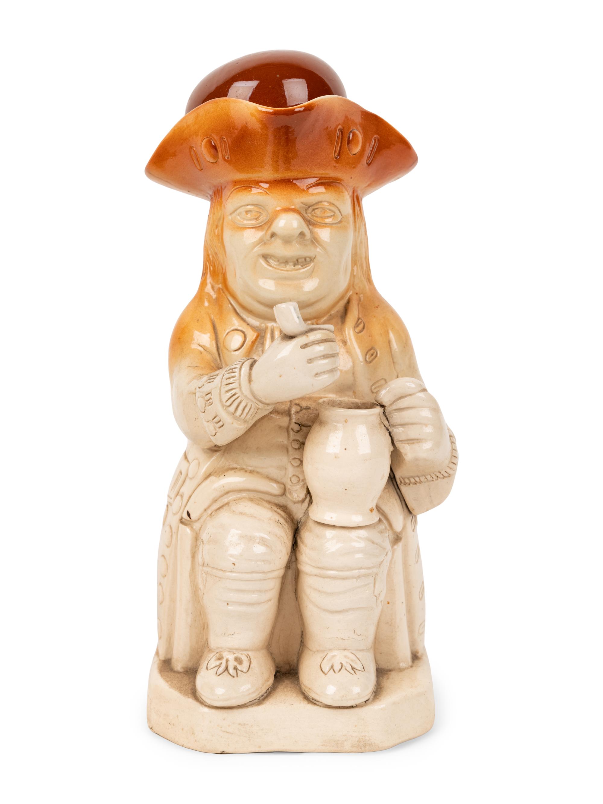 A Pearson & Co. Whittington Moor Toby Jug with Cover and a Stoneware Toby Flask