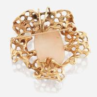 A gold, coral, and diamond pendant brooch