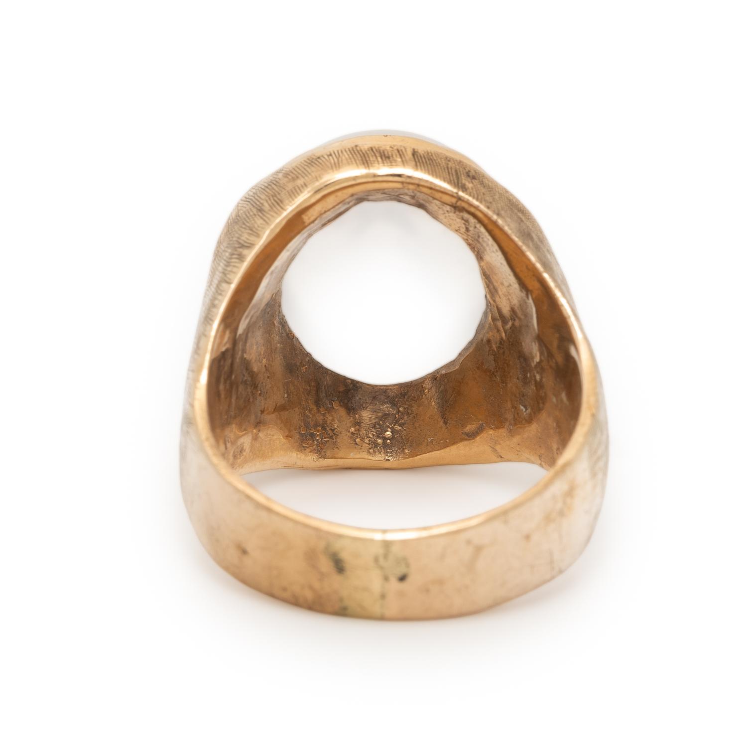 CARVED MOONSTONE AND YELLOW GOLD 'MAN IN THE MOON' RING