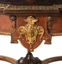 A Napoleon III Gilt Bronze Mounted Marquetry Center Table