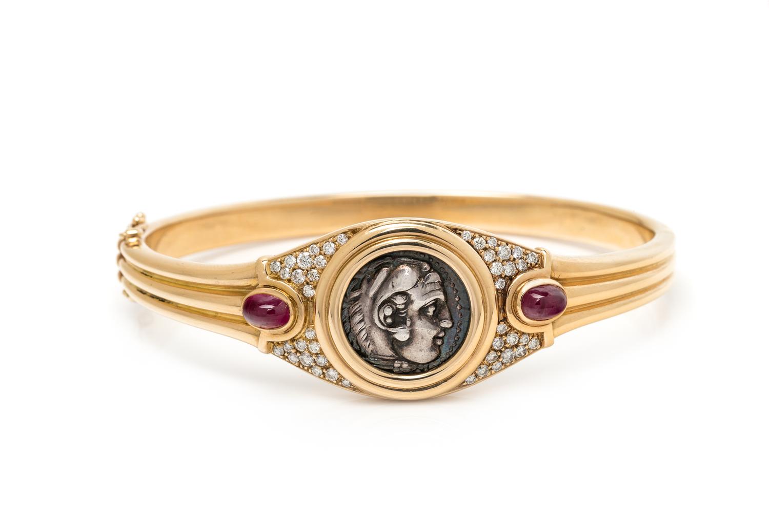 BVLGARI, YELLOW GOLD, COIN, RUBY AND DIAMOND 'MONETE' BANGLE BRACELET