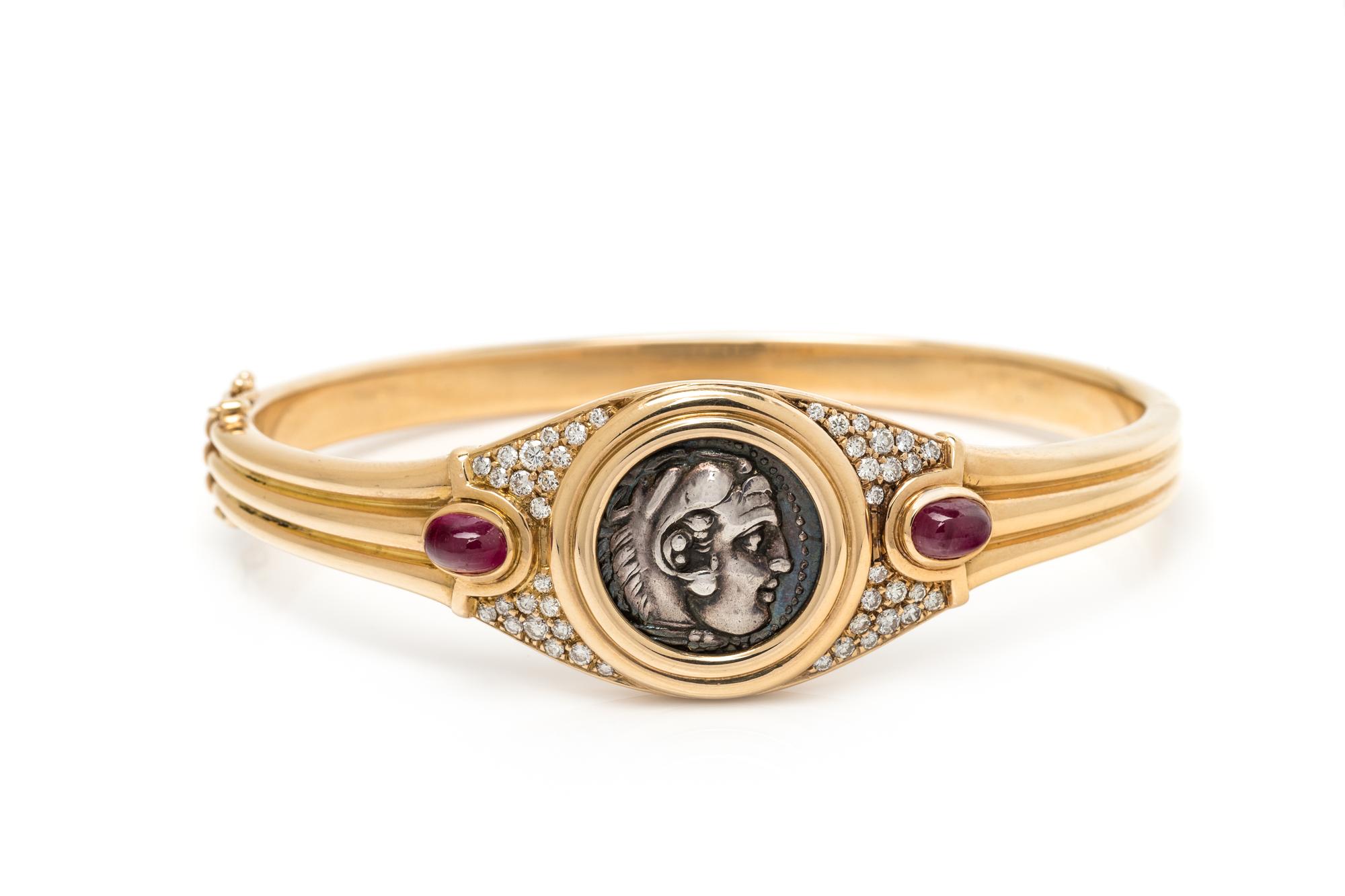 BVLGARI, YELLOW GOLD, COIN, RUBY AND DIAMOND 'MONETE' BANGLE BRACELET