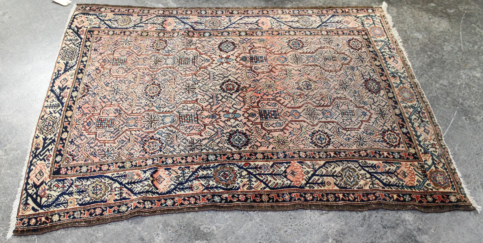 A Northwest Persian Wool Rug 5 feet 9 inches x 4 feet 7 inches. — FIRST HALF 20TH CENTURY