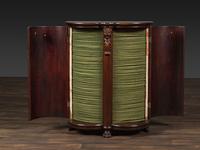A Salter Double Bow-Front Lion Mask Carved Mahogany Record Cabinet