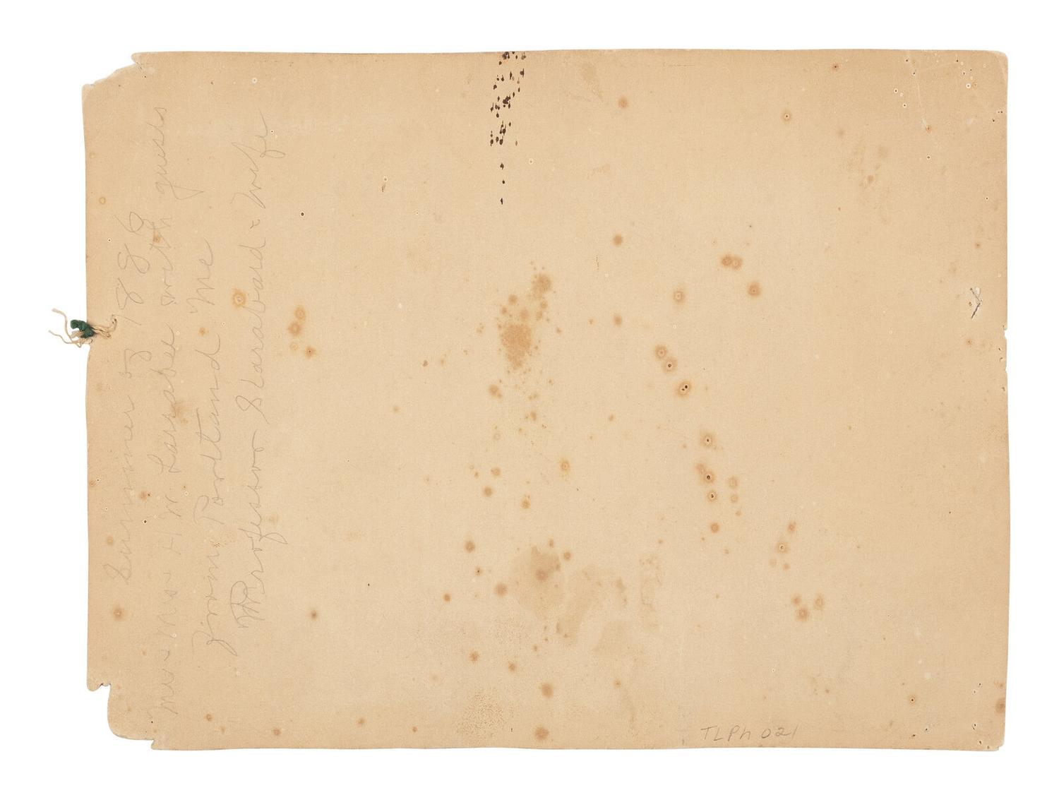 [LINCOLN'S FUNERAL]. A travertine marble fragment from the receiving vault which contained Abraham Lincoln's remains at Oak Ridge Cemetery, Springfield, Illinois, from 4 May to 21 December 1865.