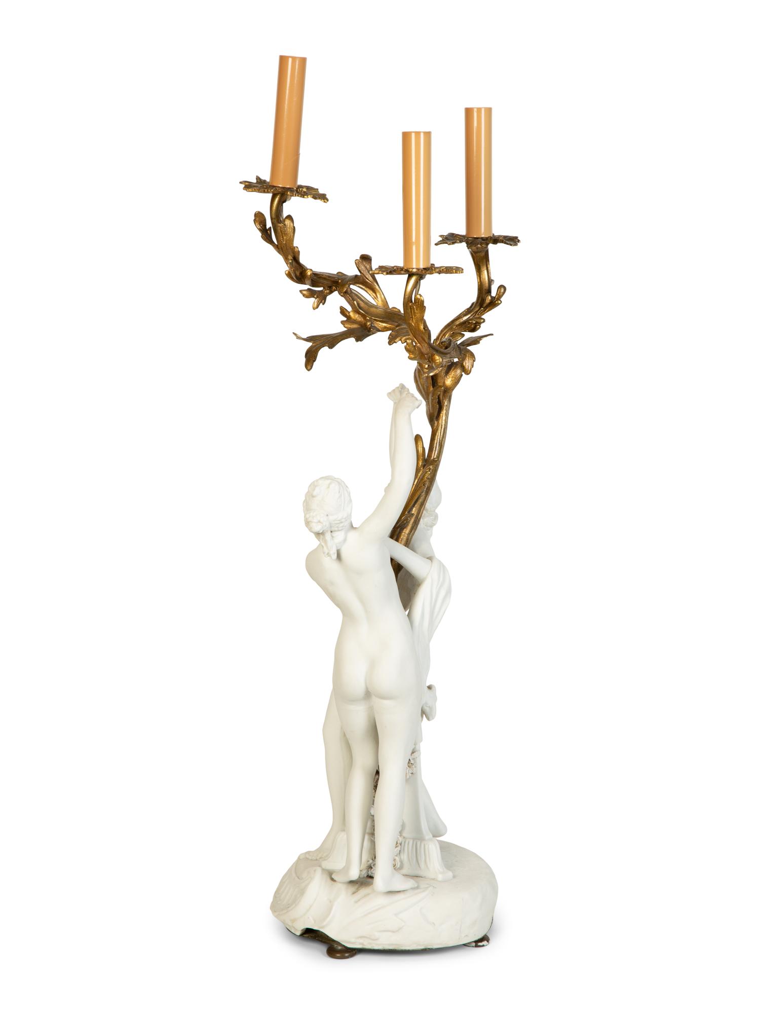 A Gilt Bronze Mounted Bisque Porcelain Candelabrum