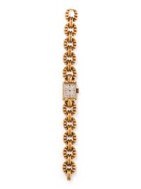 GÜBELIN, 18K YELLOW GOLD WRISTWATCH
