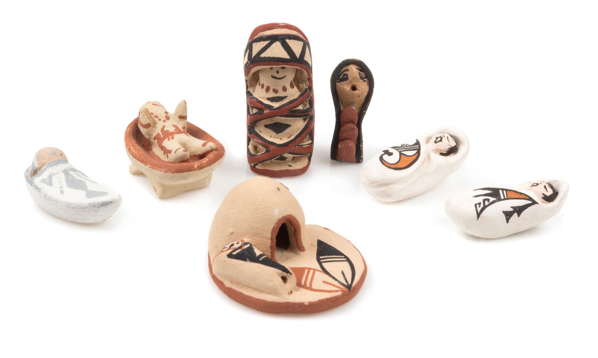 A Collection of Native American Pottery Figures Length of longest 1 3/8 inches.