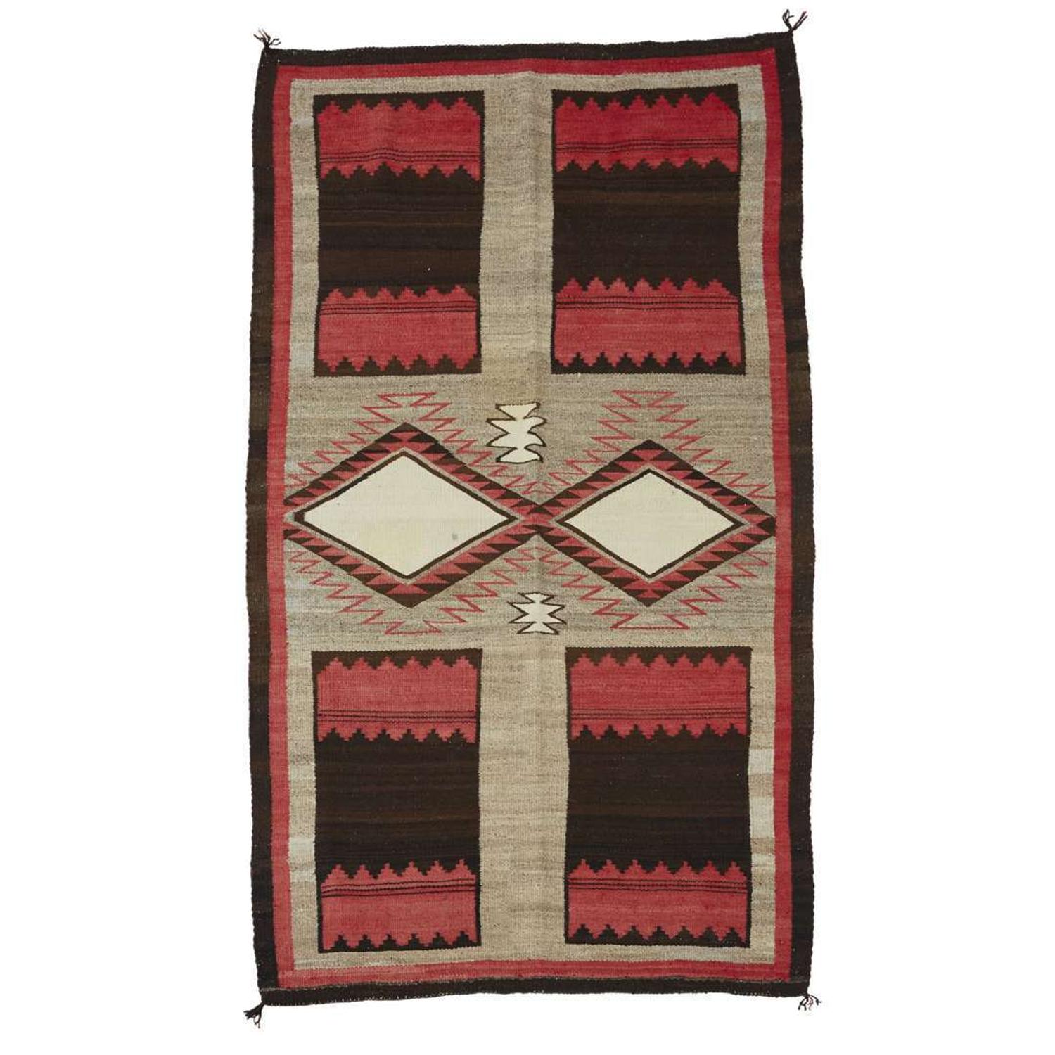 Navajo rug with unusual dress pattern 20th century